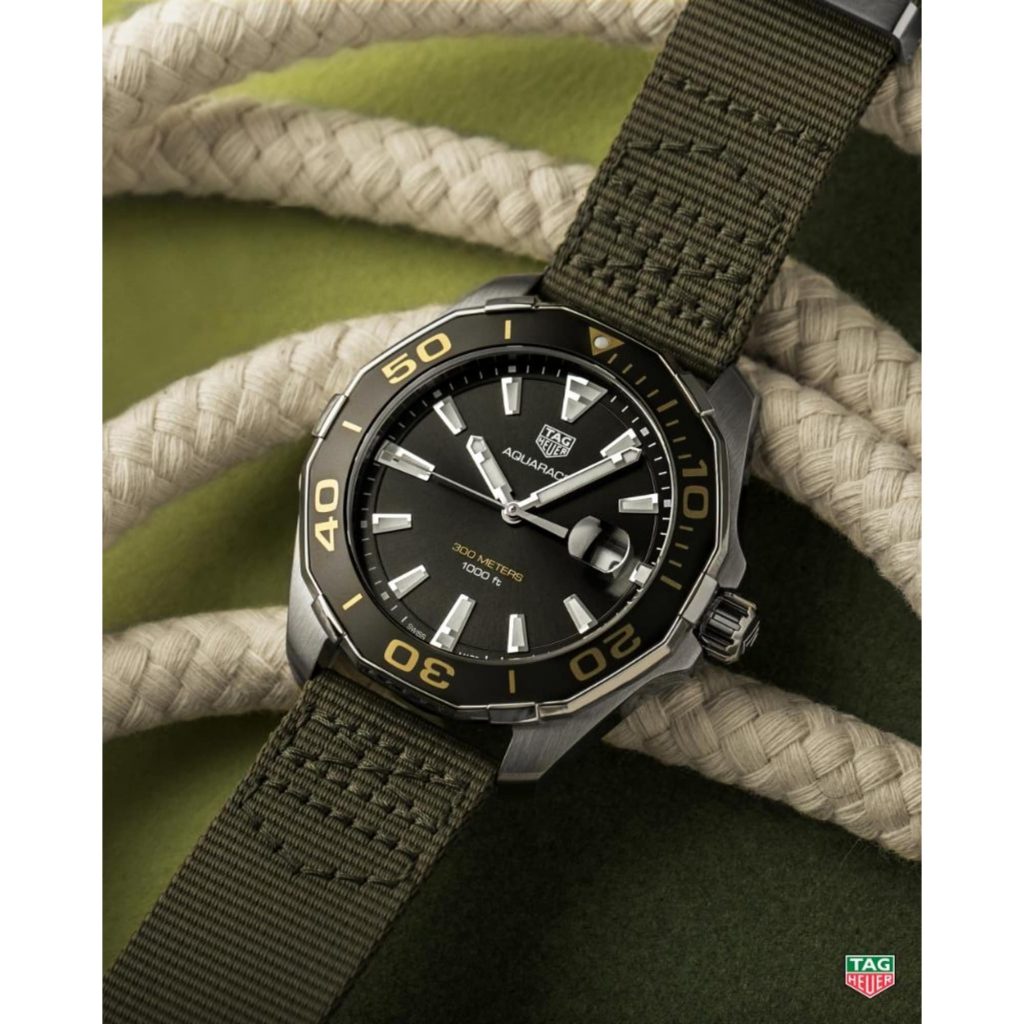 The Khaki green strap fake watch has grey dial.
